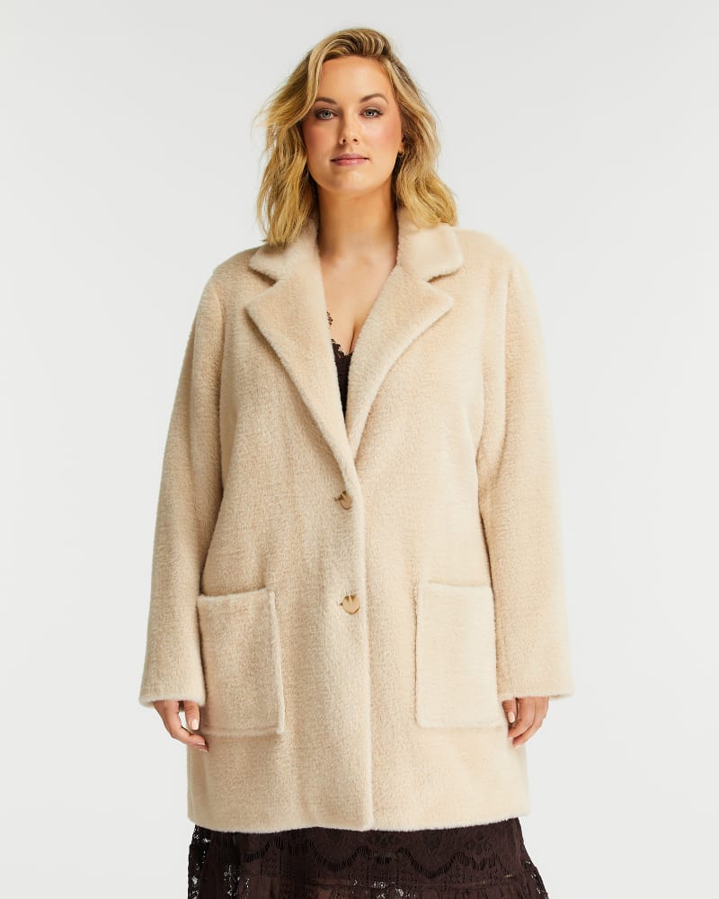 Front of a model wearing a plus size Polar Coat in Shell by Estelle. | dia_product_style_image_id:234946